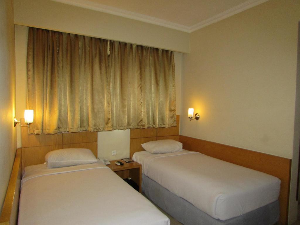 Hotel Wisata Палембанг Номер фото