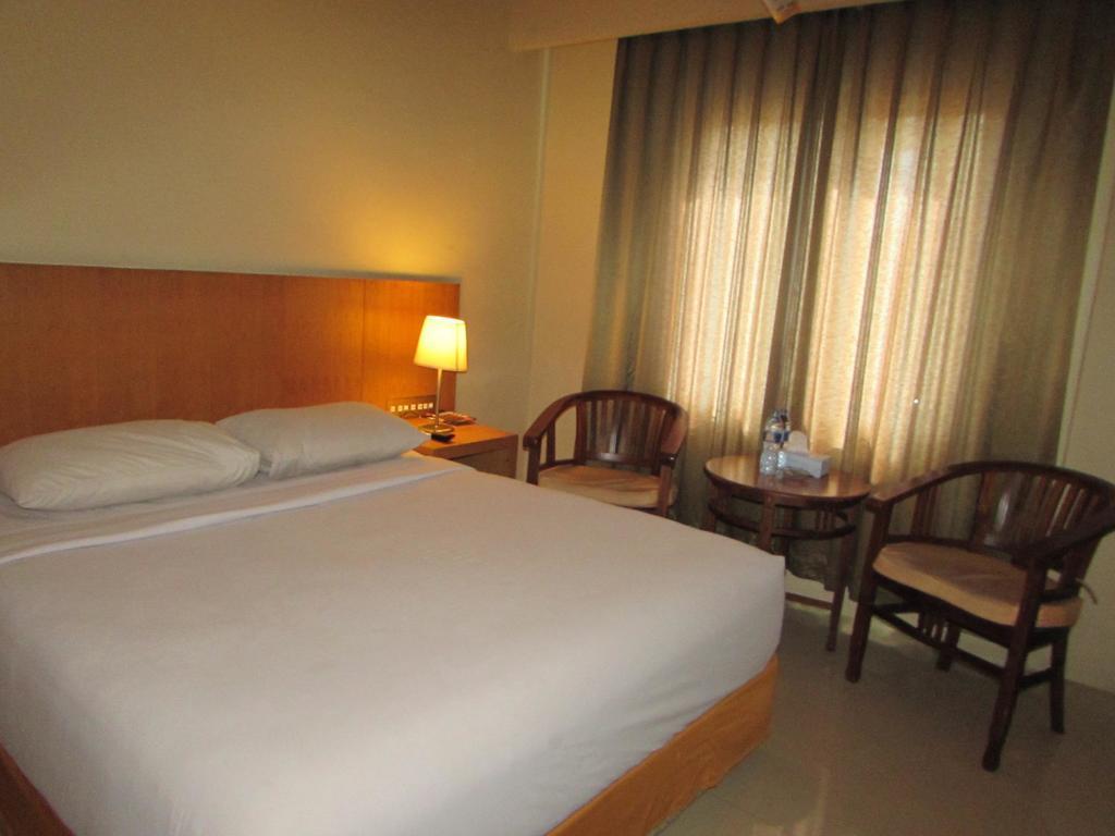 Hotel Wisata Палембанг Номер фото